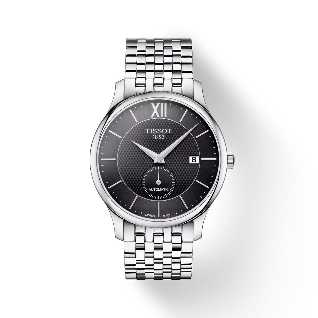 RELOJ TISSOT TRADITION, AUTOMCÁTICO, ESFERA NEGRA, BRAZALETE DE ACERO, FECHA, 40 MM