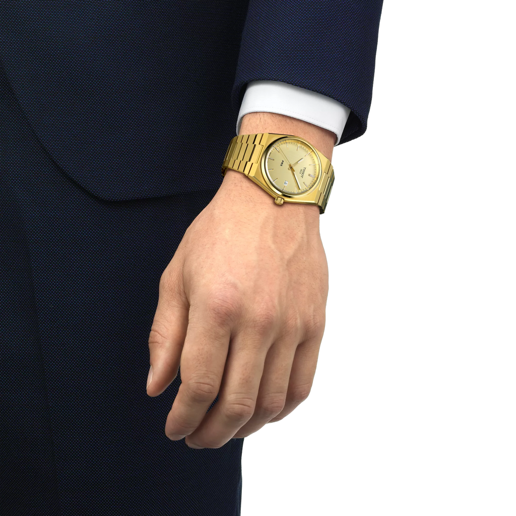 RELOJ TISSOT PRX, CUARZO, ESFERA DORADA, BRAZALETE DE ACERO PVD TONO ORO, FECHA, 40 MM