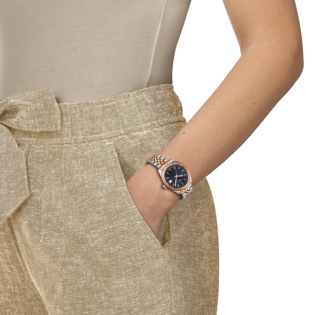 RELOJ TISSOT BALLADE, CUARZO, ESFERA AZUL, BRAZALETE DE ACERO BICOLOR TONO ROSA, FECHA, 34 MM