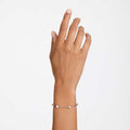 PULSERA SWAROVSKI CONSTELLA TALLA REDONDA, BLANCO, BAÑO TONO ORO ROSA, TALLA M