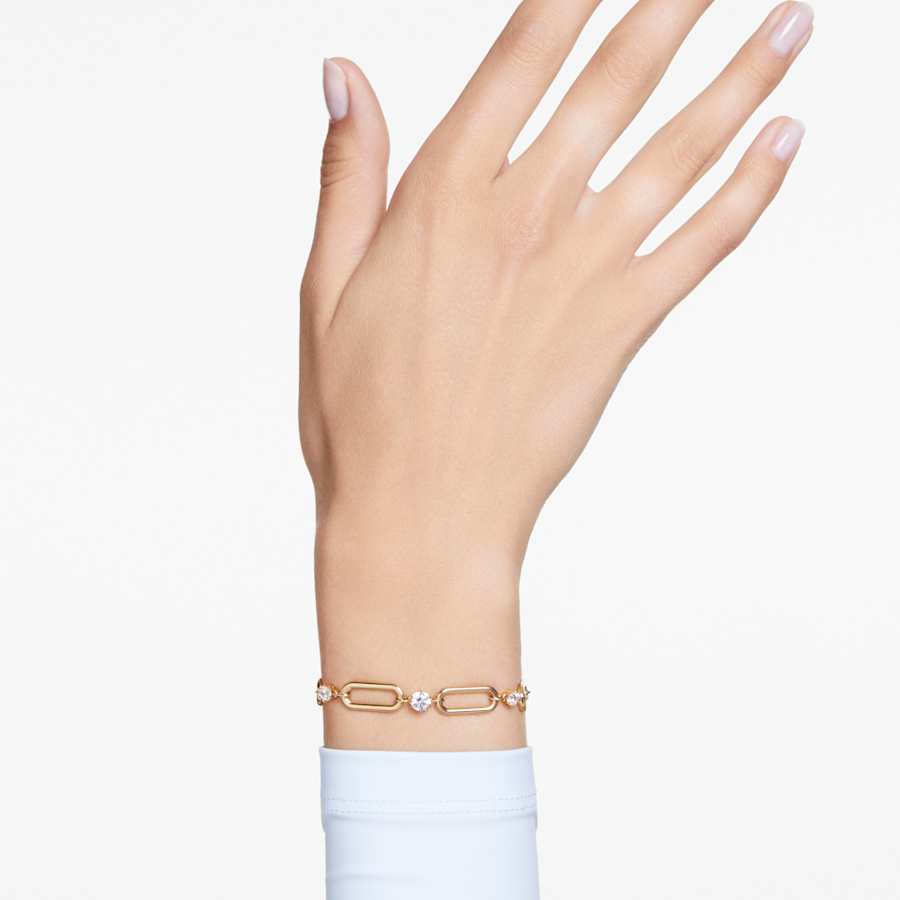 PULSERA SWAROVSKI CONSTELLA BLANCA, BAÑO TONO ORO, TALLA M