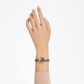 RELOJ SWAROVSKI CRYSTAL ROCK OVAL, BRAZALETE DE ACERO PVD ORO ROSA, ESFERA CAFÉ, CUARZO