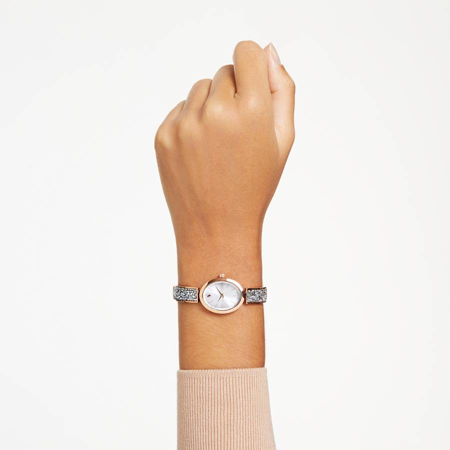 RELOJ SWAROVSKI CRYSTAL ROCK OVAL BRAZALETE DE ACERO INOXIDABLE PVD ORO ROSA, ESFERA GRIS, MOVIMIENTO CUARZO, CAJA 29 X 26 MM, MUJER