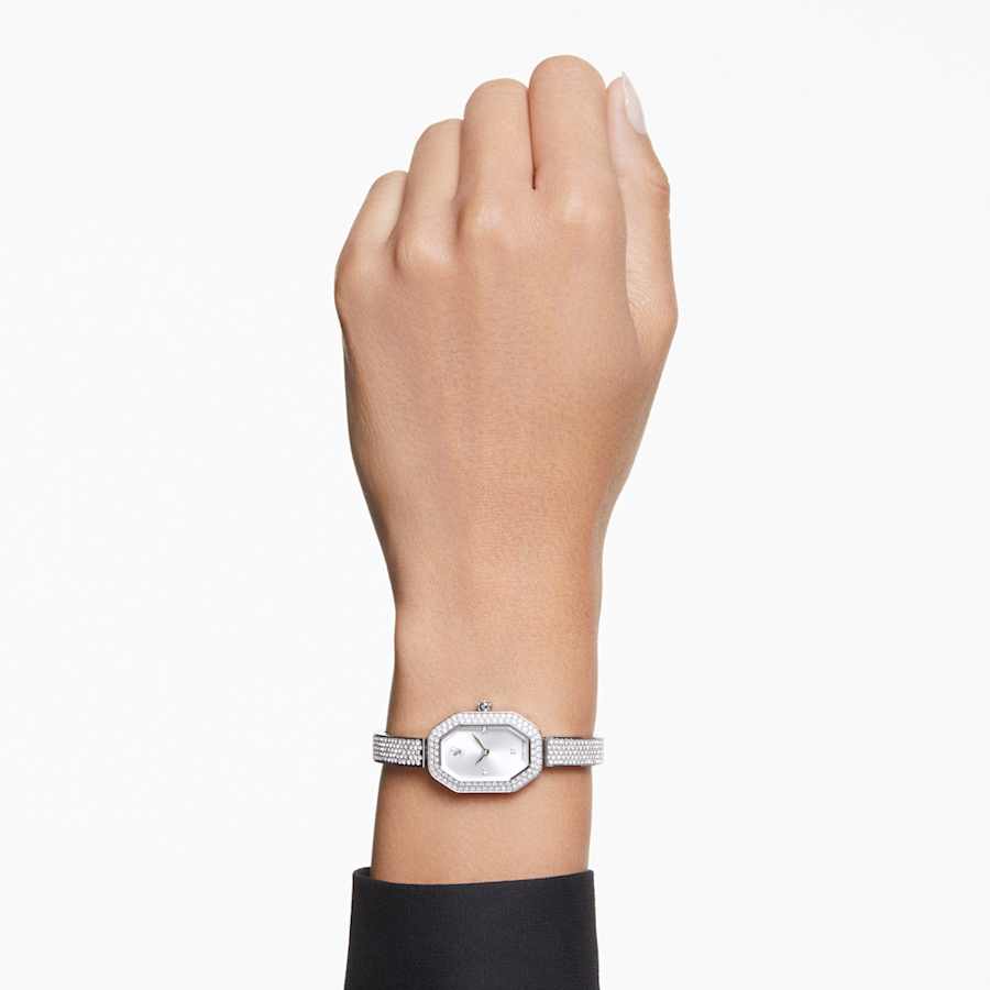 RELOJ SWAROVSKI DEXTERA BANGLE, BRAZALETE DE ACERO INOXIDABLE, ESFERA PLATEADA, MOVIMIENTO CUARZO, CAJA 1 1/4 X 3/4 PULGADAS, MUJER