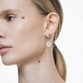 ARETES SWAROVSKI NUMINA TALLAS MIXTAS, BLANCO, BAÑO TONO ORO