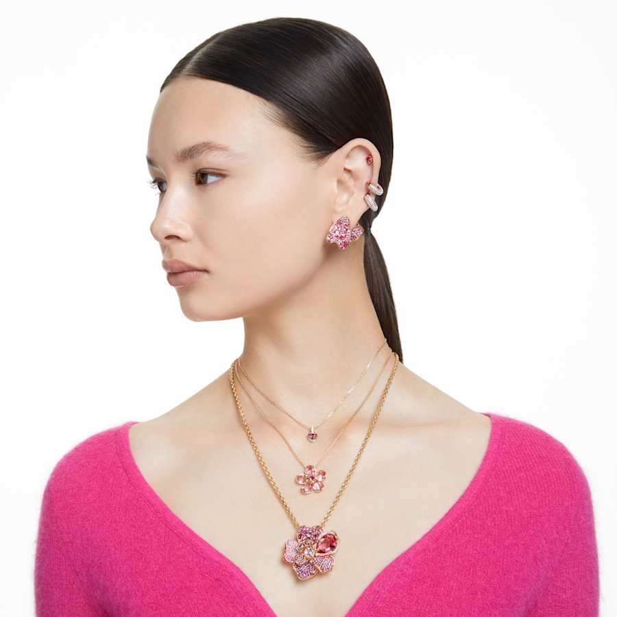 ARETES SWAROVSKI FLORERE, DISEÑO ASIMÉTRICO, ROSA, BAÑO TONO ORO