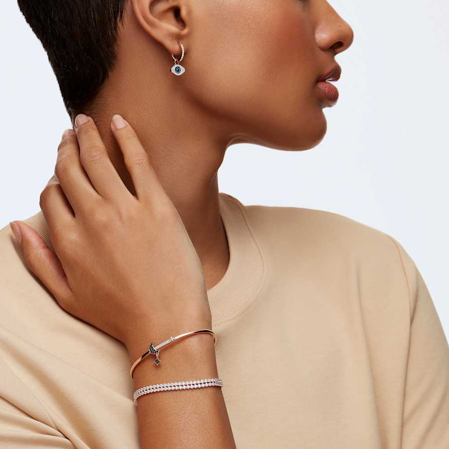 ARETES SWAROVSKI  SYMBOLICA OJO TURCO, AZULES, BAÑO TONO ORO ROSA